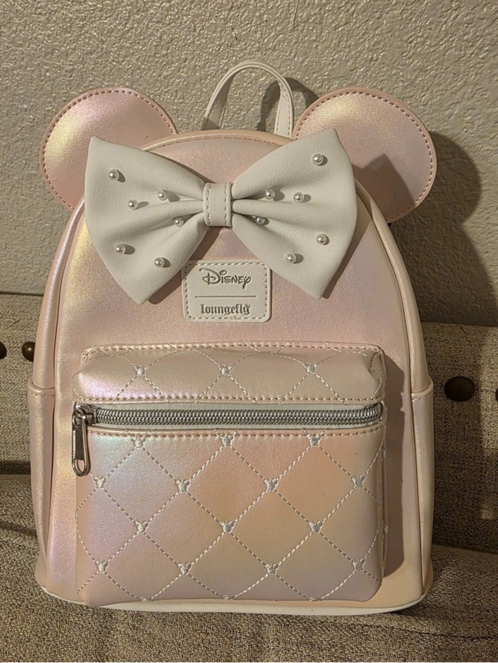Loungefly Iridescent Pink Minnie Ear Mini Backpack with White Bow